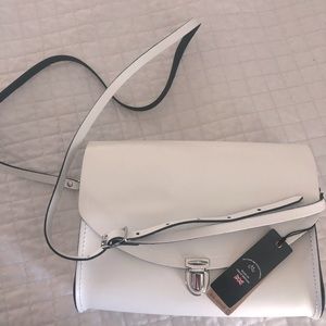 THE CAMBRIDGE SACHEL COMPANY